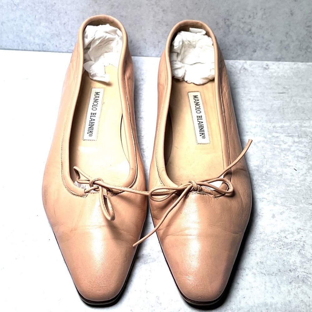 Manolo Blahnik nude pointed ballet flats.